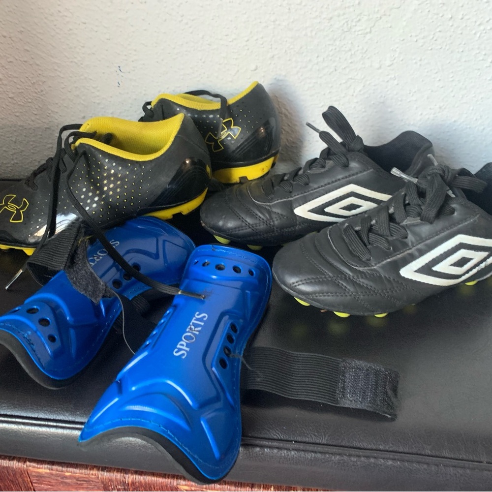 Soccer Cleats with Blue Shin Guards Lot